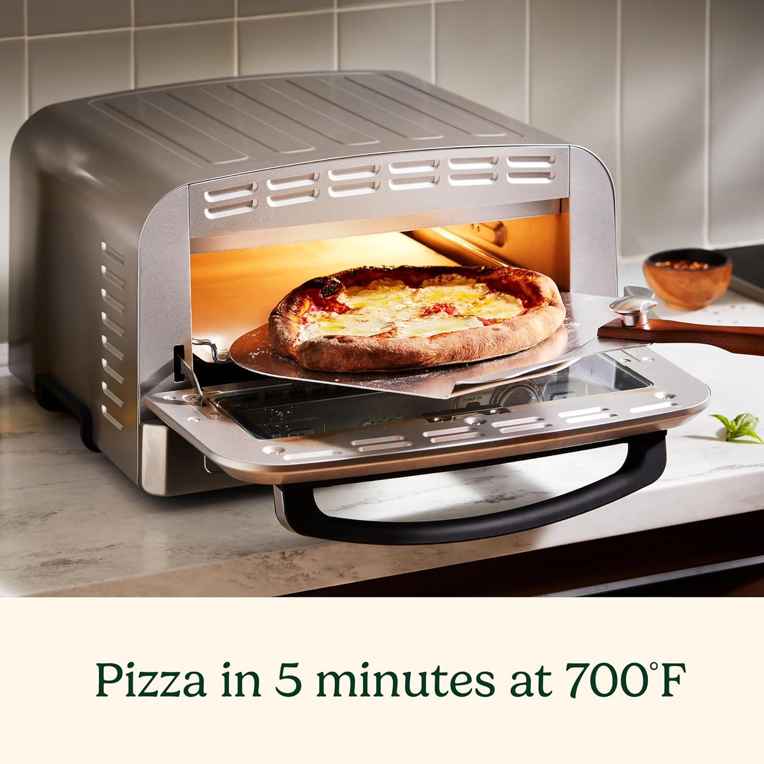 imageCuisinart Indoor Pizza Oven Bakes 12 Pizzas in Minutes Countertop Electric Pizza Oven Heats up to 700F Large Viewing Window Interior Light Includes 125 Pizza Stone CPZ120 Stainless SteelStainless Steel